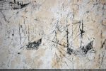 Graffiti présentant deux bateaux (les deux croquis sont sur des couches d’enduit différentes)