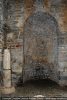 Baptistère : absidiole nord et colonne romaine réutilisée dans l’église